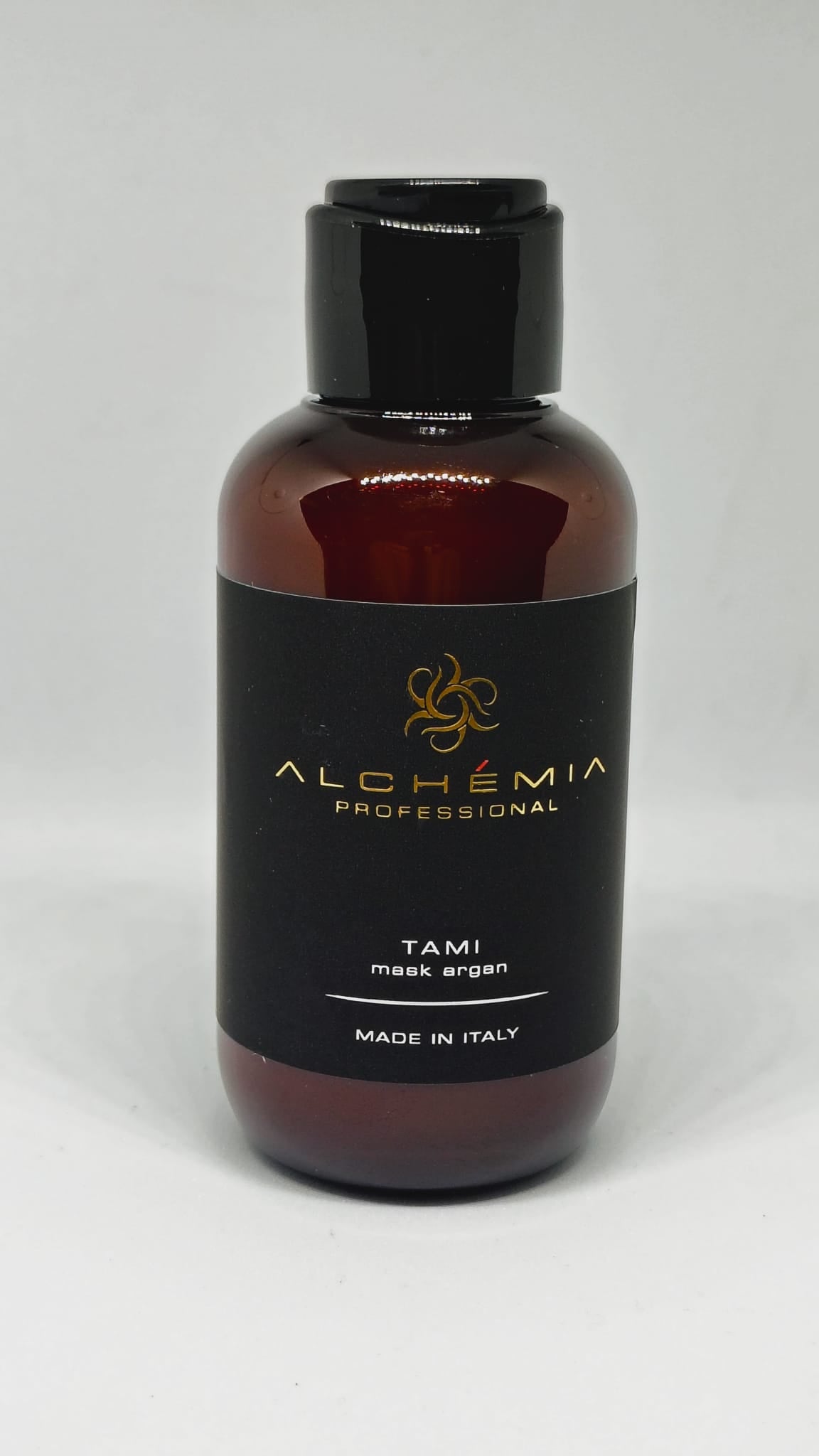 Maschera Argan per capelli secchi e ribelli in bottiglia elegante con erogatore.