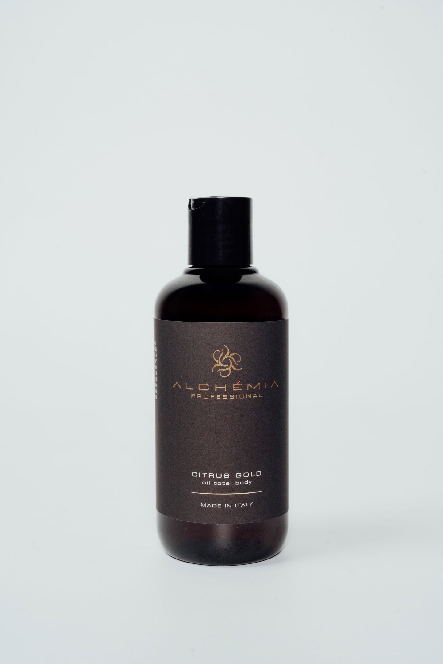 Shampoo Oil Total body-Citrus Gold bottle with a sleek design, made in Italy, perfect for hair and body care.